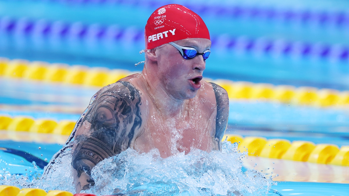 Adam Peaty competes in the semi-finals of the 100m Breaststroke at the Tokyo 2020 Olympic Games